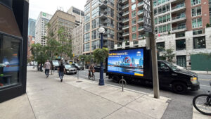 media-truck-advertising-in-toronto2 Media truck advertising with a 3-sided HD LED screen on a downtown Toronto street